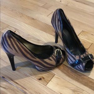 High heels with black buckles